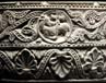 Bild: 9015206 (9015206.jpg). Motiv: medaljong med Agnus Dei i bladranka. Foto: Lennart Karlsson